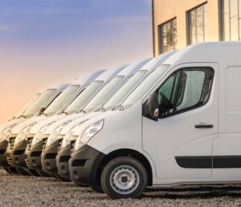 commercial delivery vans parked in row. Transporting service company. commercial delivery vans parked in row. Transporting service company.
